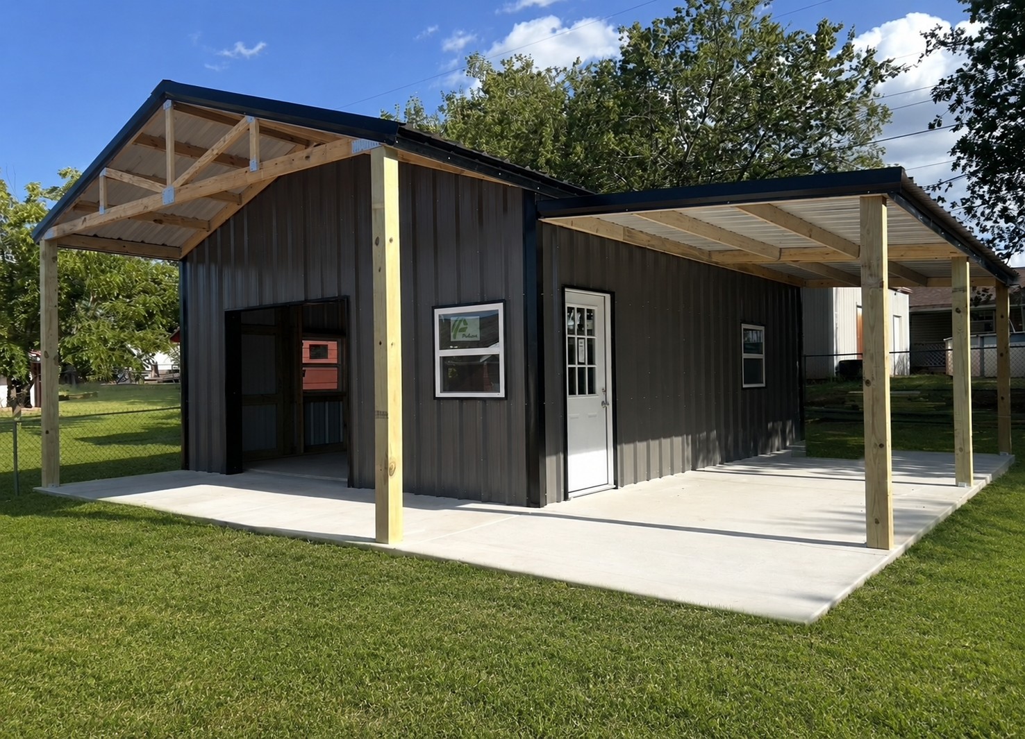 Wood frame building with covered front and side areas