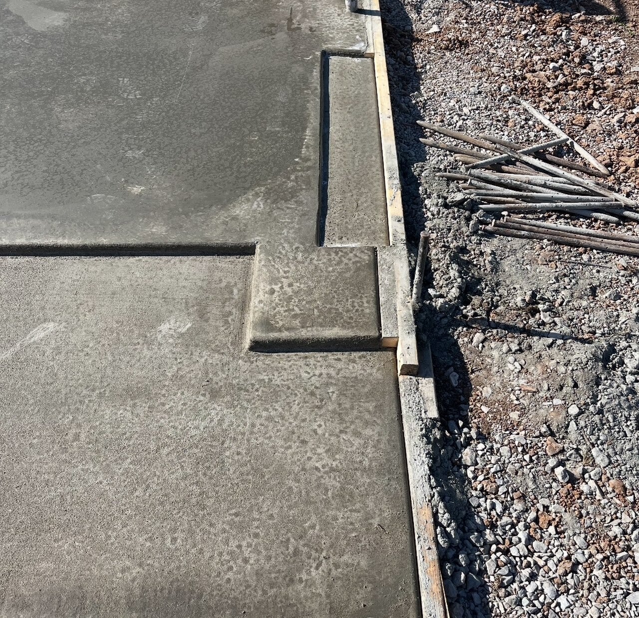 Concrete walk door opening showing the inset and perimeter lip detail